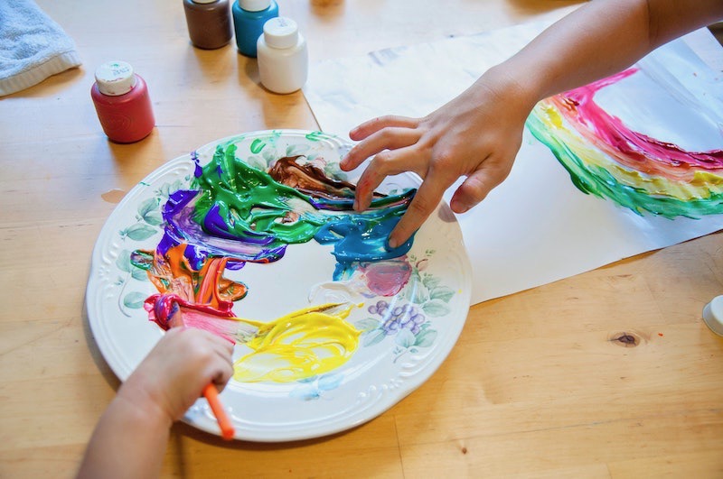family finger painting